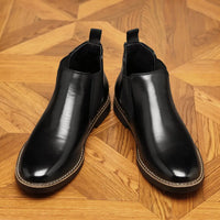 Formal pointed-toe leather boots